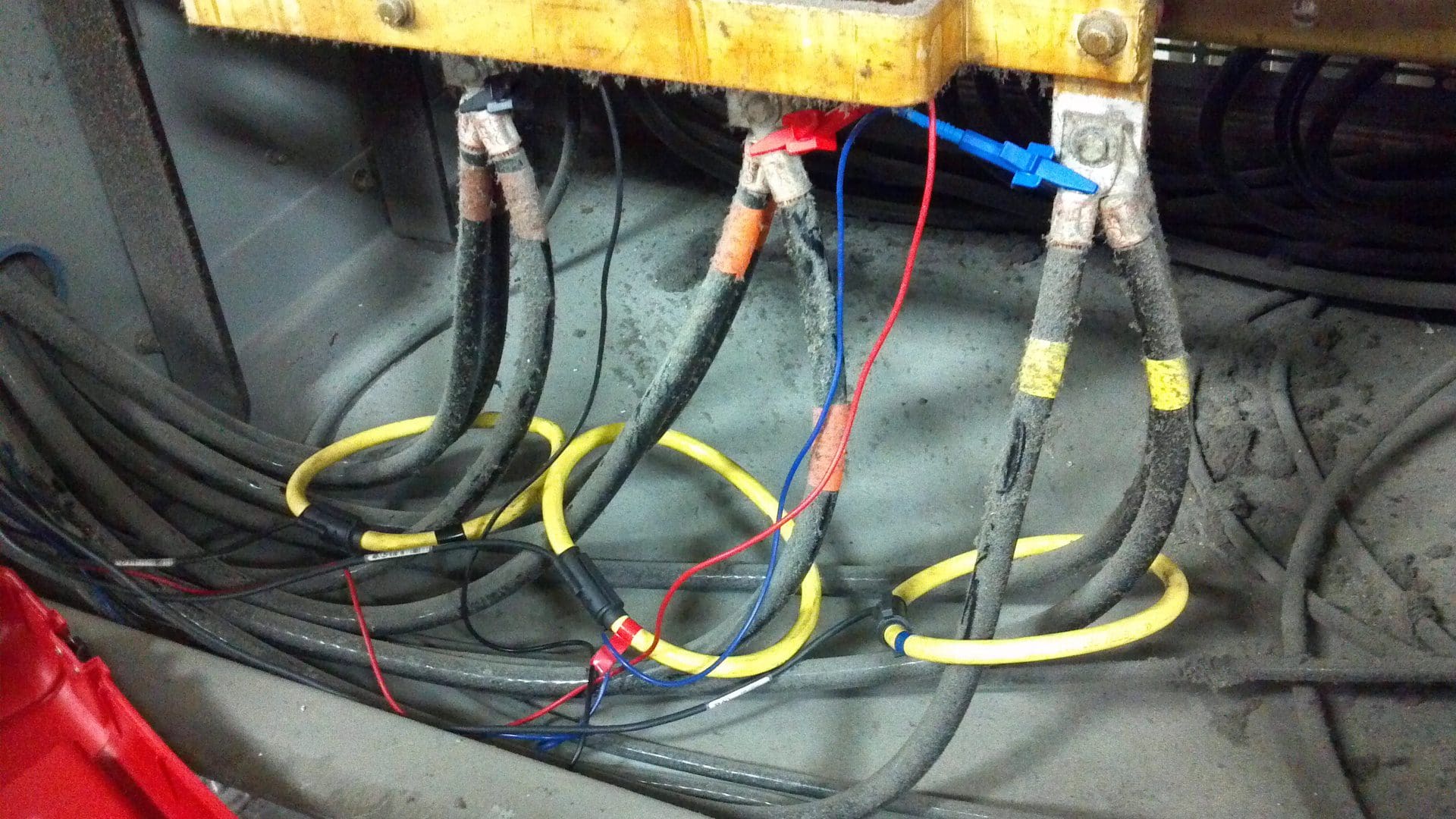 Close-up of electrical cables connected to a panel.