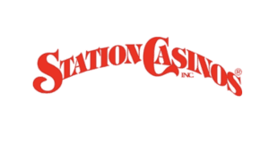 Red text logo reading 'Station Casino Inc.'